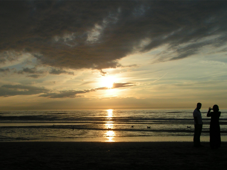 Taking photos on the beach